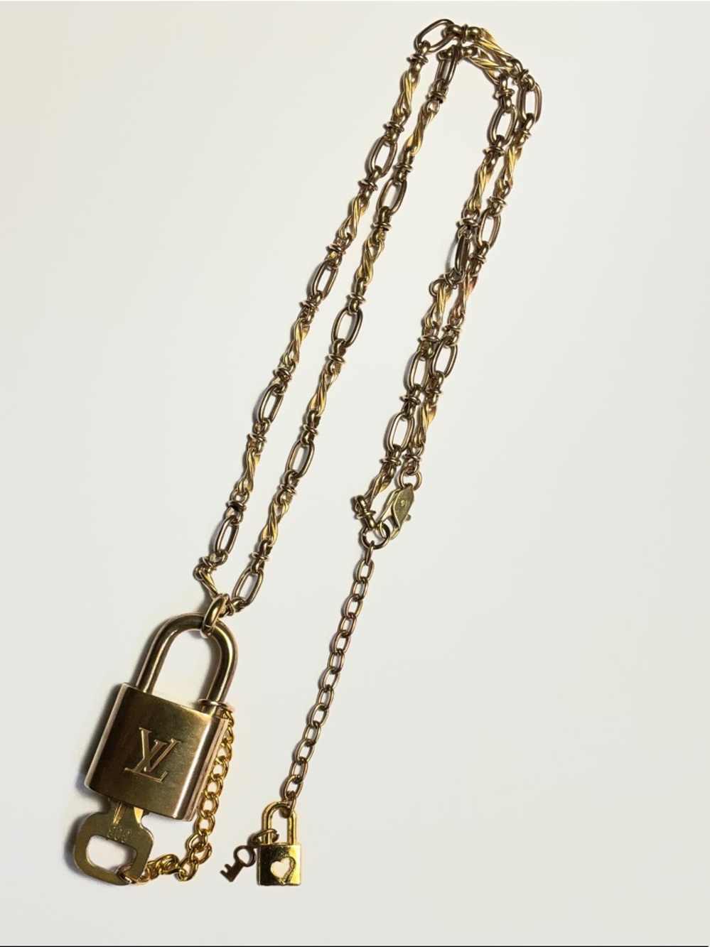 Authentic Louis Vuitton Brass Padlock and Key #303 put on a chain